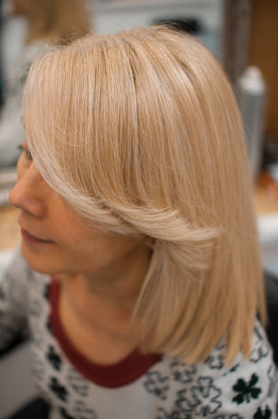 istock Blonde woman in profile 1184706004