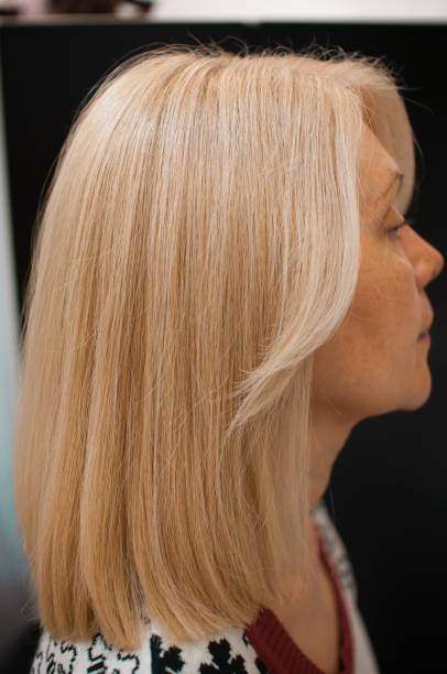 istock Blonde woman in profile 1184706008