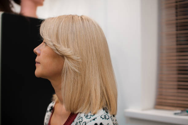 istock Blonde woman in profile 1184706040