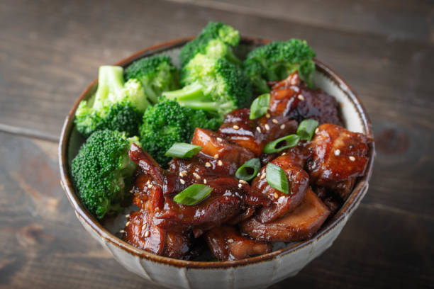 istock teriyaki chicken rice bowl with broccoli 1184706242