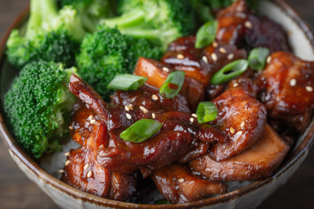 istock teriyaki chicken rice bowl with broccoli 1184706310