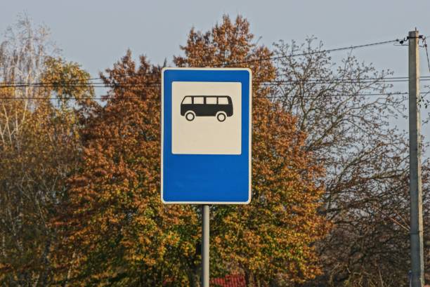 istock road sign bus stop on a background of vegetation 1184709949