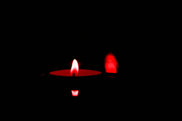red candle stock photo