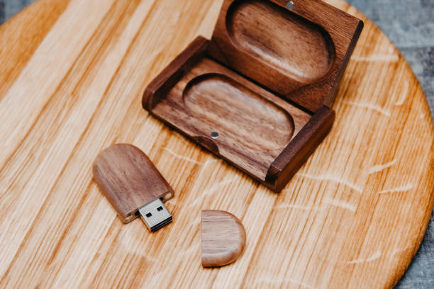 istock Wooden usb flash drive in a box of solid wood. Handwork. 1184711445