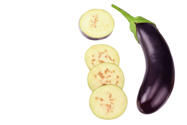 istock eggplant with slices isolated on white background. top view 1184713148