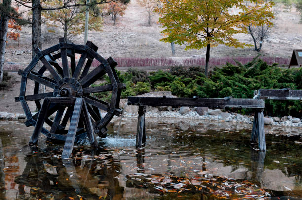 wooden water mill on the creek