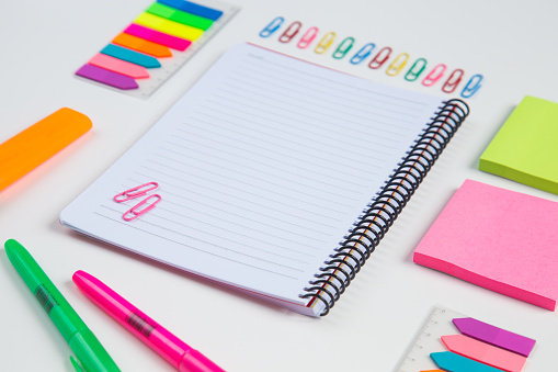 ideas creativity concepts with flat lay of colorful stationery on white background. back to School. Modern mock up of business. colored pencil,colorful paper clips