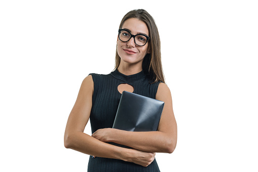 Portrait of young business woman in glasses black dress with digital tablet, isolated on white background
