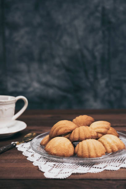 istock French madeleines with cup of coffee 1184725800
