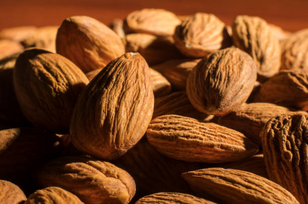 istock many fresh and roasted almonds 1184727065