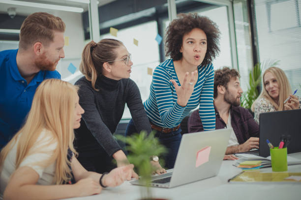 istock Young people in the office 1184729504