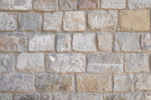 Close up fortified stone wall texture background