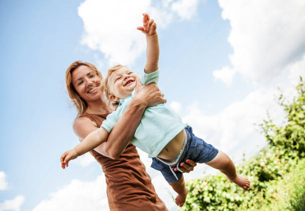 istock Mother Playing With Her Toddler 1184729804