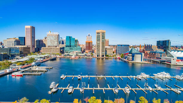 baltimore, maryland, usa inner harbor drone skyline aerial - baltimore maryland inner harbor skyline stock-fotos und bilder