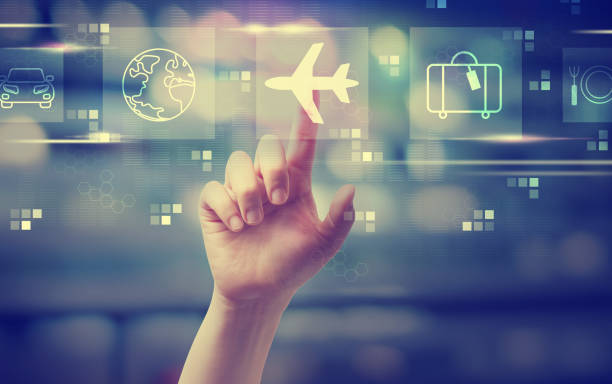 istock Airplane travel theme with hand pressing a button 1184747477