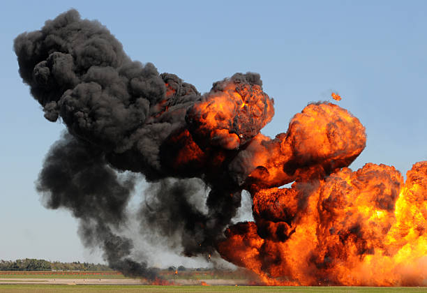 istock Giant orange, yellow, and black fire explosion 118476083