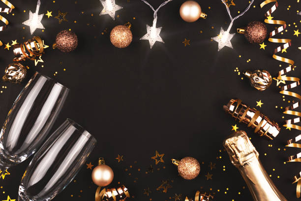 istock New Year composition with confetti, decorations and champagne. 1184765193