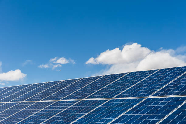 istock solar panels closeup against a sunny sky 1184771942