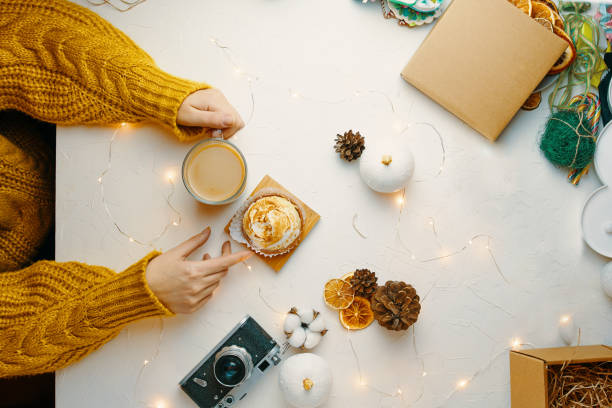 istock Coffee and cake with cream on the table. 1184778765