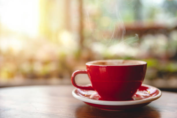 istock Hot Drinks in Coffee Cup on Wood Table in  Cafe with Space for text. 1184782569