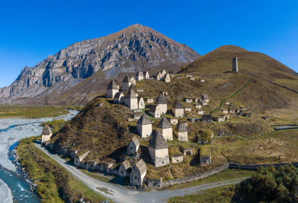 Dargavs, the medieval city of the dead in the mountains of the Caucasus. Dargavs, the medieval city of the dead in the mountains of the Caucasus. North Ossetia. Shot on a drone. north caucasus photos stock pictures, royalty-free photos & images