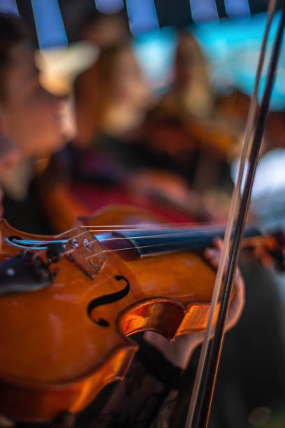 istock violin at a concert 1184785104