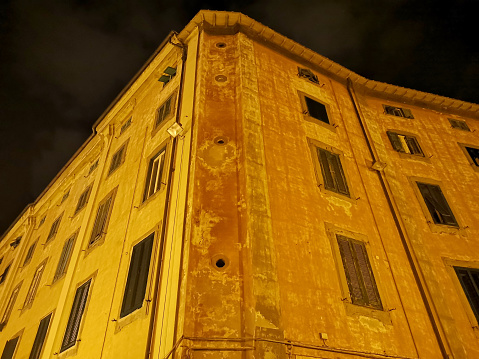Old residential building in Venezia quarter by night, Livorno, Tuscany