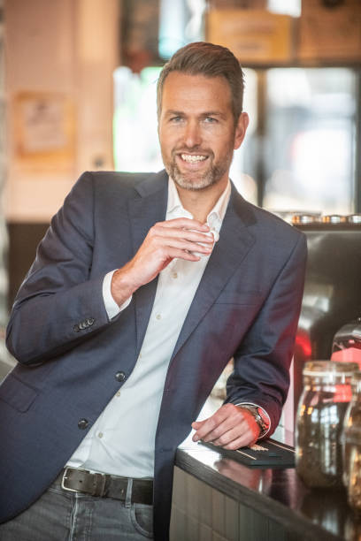 istock Man drinking espresso on his coffebreak 1184788414