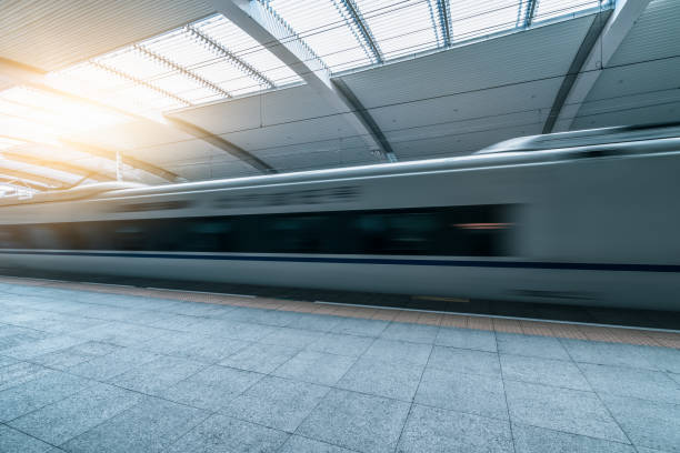 istock Subway station with train running in blurred motion 1184792642