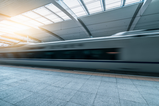 Blurred motion of subway train at subway station Hamburg Hafencity