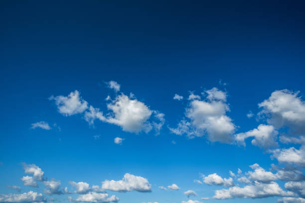 istock Universal background. White clouds in the blue sky. 1184800812