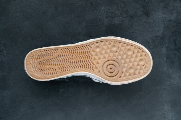 dirty and dusty used sneaker shoe sole the bottom parts