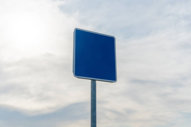 istock empty road sign with copy space mock-up design against the sky 1184804757