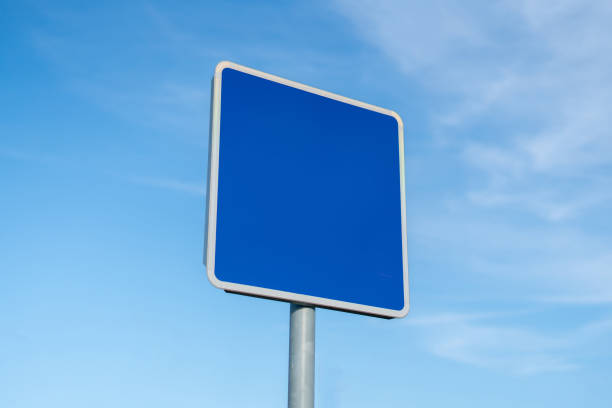 istock empty road sign with copy space mock-up design against the sky 1184804758