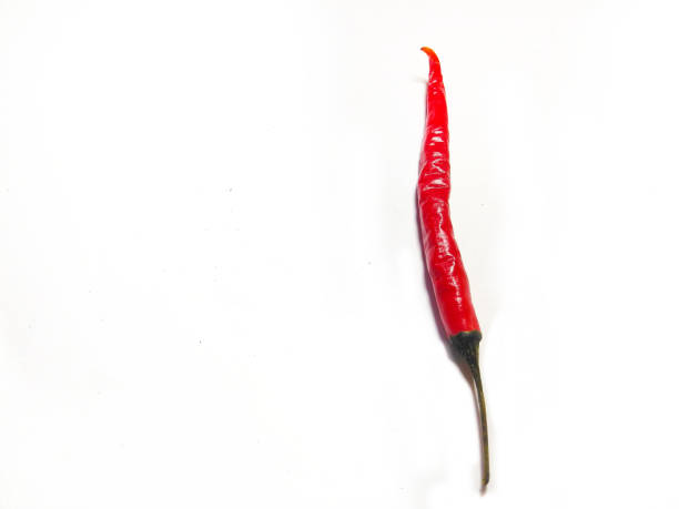 istock Red hot chili pepper isolated on white background 1184806370