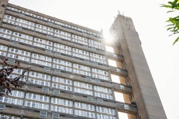 Exterior of London brutalist high rise trellick tower block showing balconies Facade of a Brutalist style tower block, trellick tower, in London trellick tower stock pictures, royalty-free photos & images