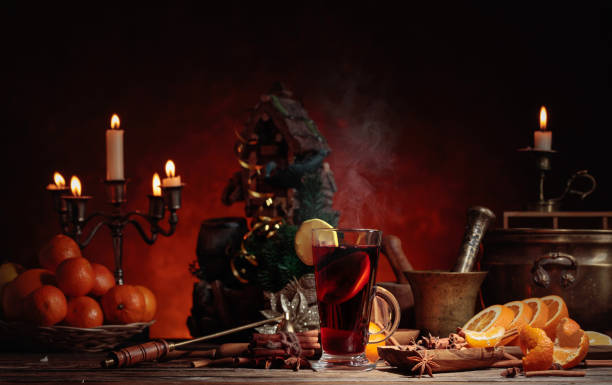 istock Mulled wine and Christmas decorations with candlesticks. 1184808026