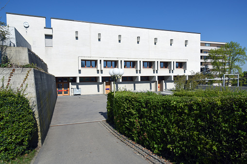 The School Building Schwammendingen (Schulhaus Stettbach) was planned by the Architects Esther and Rudolf Guyer in 1967. The Image was captured during spring season.