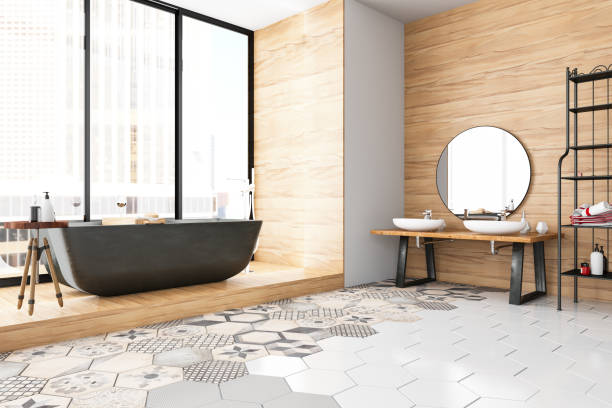 Modern Bathroom Bathtub in the modern interior tiled floor stock pictures, royalty-free photos & images