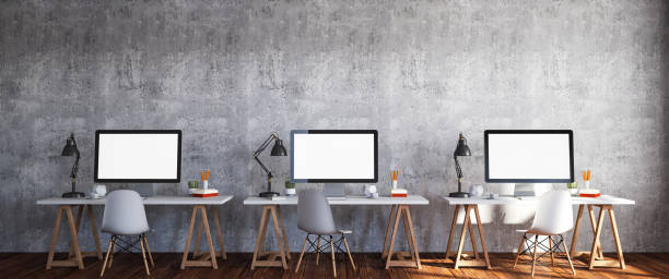 istock Modern Business Office Interior with Three Computers Wide Shot 1184811233