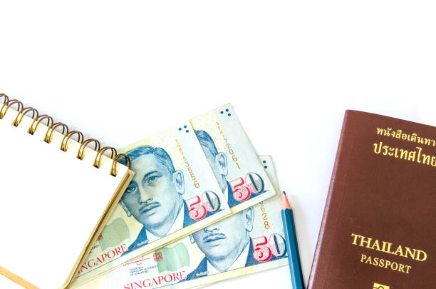 シンガポールドルとパスポート - ten dollar bill ストックフォトと画像