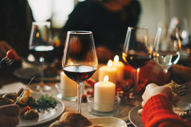 istock Friends enjoying a Christmas dinner together 1184816208