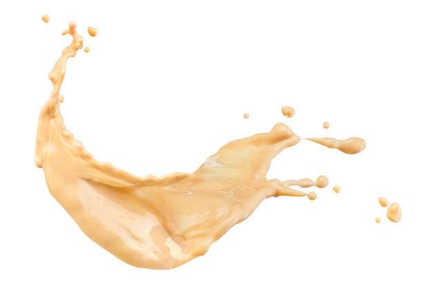 istock Coffee splash with milk on a white background 1184816317