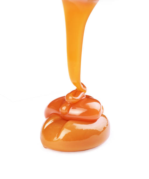 istock candy caramel poured with liquid caramel 1184816318