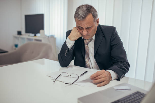 istock Concerned businessman in his office 1184819725