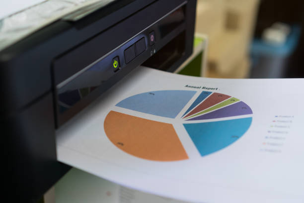 istock Printer printing document graph diagrams for report finacial business in office. Printer scanner for paper copy machine supplies start at workplace 1184819836