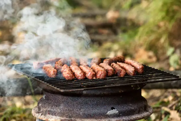 Photo of Balkan cuisine Pork Cevapi on the grill