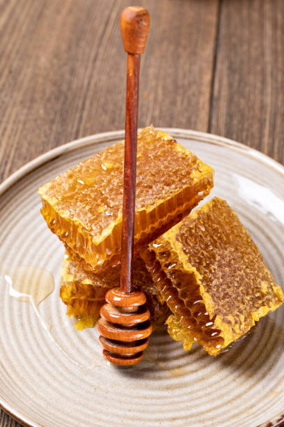 istock Honey and Honeycomb slice 1184823237
