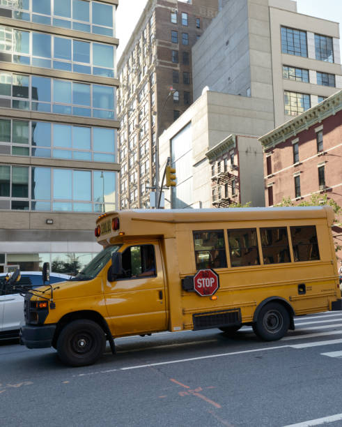 istock School Bus, Midtown, NYC. 1184825400