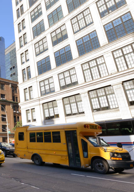 istock School Bus, Midtown, NYC. 1184825420